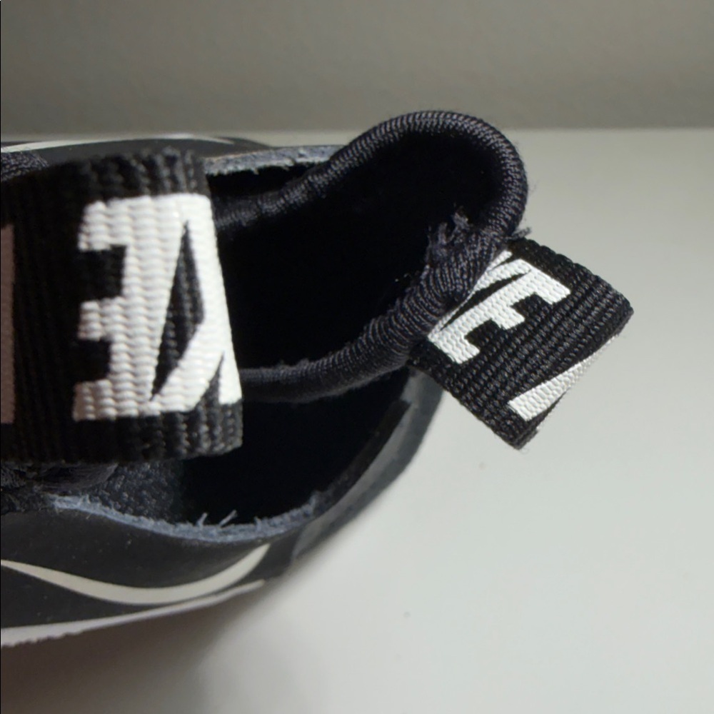 Nike Kids Black and White Slip-On Sneakers - Picture 10 of 11